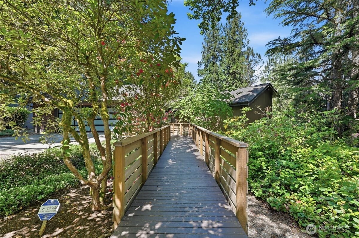 9418 Odin Way Bothell, WA 98011 - Photo 3 of 39 a view of a balcony with wooden floor