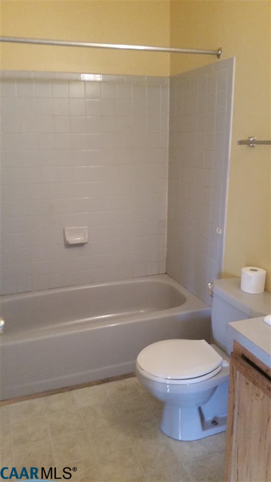 6601 Courthouse Road Louisa, VA 23093 - Photo 18 of 36 a white toilet and tub next to a shower
