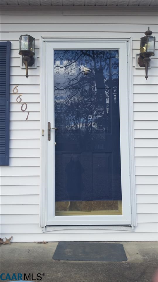 6601 Courthouse Road Louisa, VA 23093 - Photo 4 of 36 a view of a door and a window