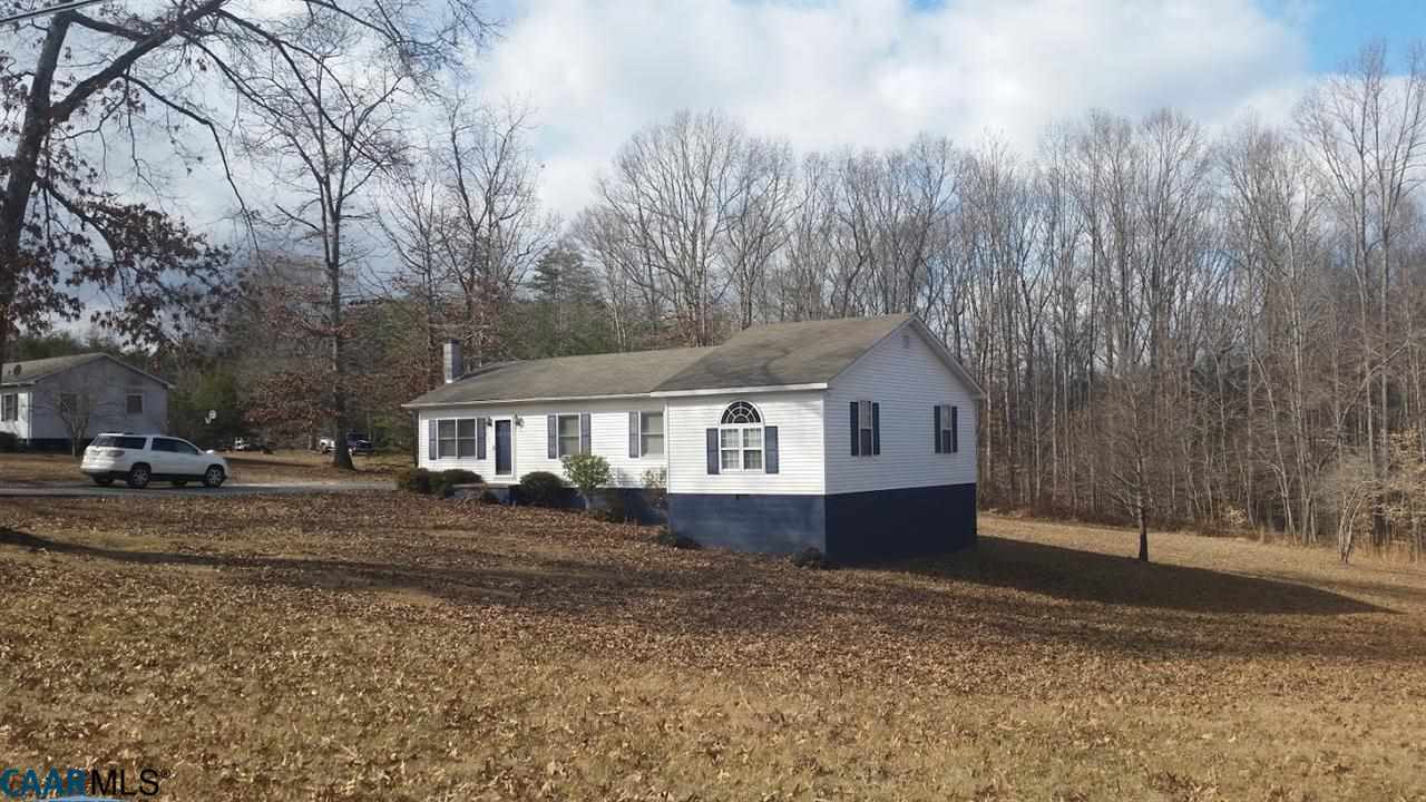 6601 Courthouse Road Louisa, VA 23093 - Photo 6 of 36 a house that has a tree in front of it