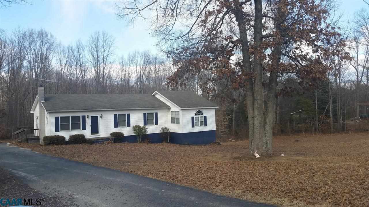 6601 Courthouse Road Louisa, VA 23093 - Photo 8 of 36 front view of a house with a yard and large trees