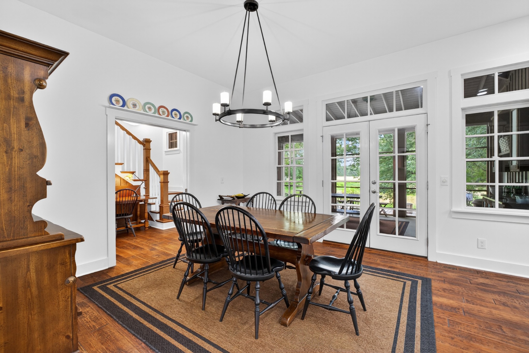 123 Jones Road Taft, TN 38488 - Photo 15 of 87 a view of a dining room with furniture wooden floor and chandelier