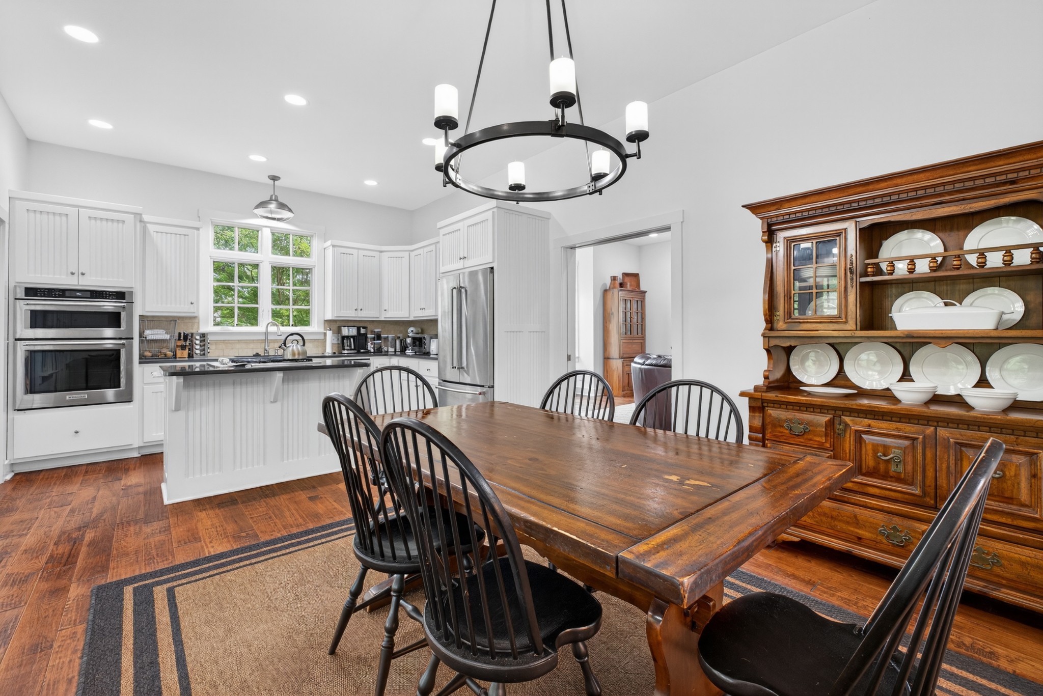 123 Jones Road Taft, TN 38488 - Photo 16 of 87 a view of a dining room with furniture window and wooden floor