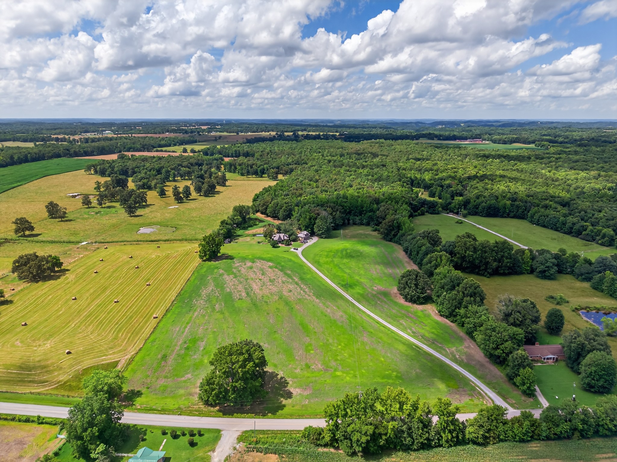 123 Jones Road Taft, TN 38488 - Photo 80 of 87 a view of a lake with a big yard