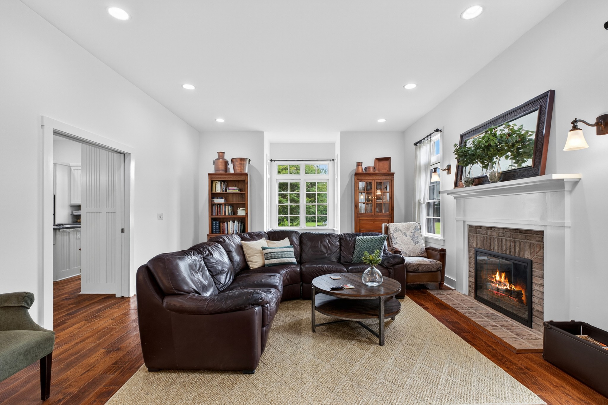123 Jones Road Taft, TN 38488 - Photo 9 of 87 a living room with furniture and a fireplace