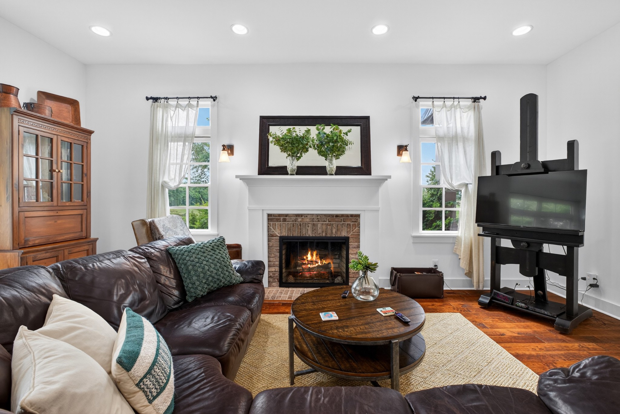 123 Jones Road Taft, TN 38488 - Photo 10 of 87 a living room with furniture and a fireplace