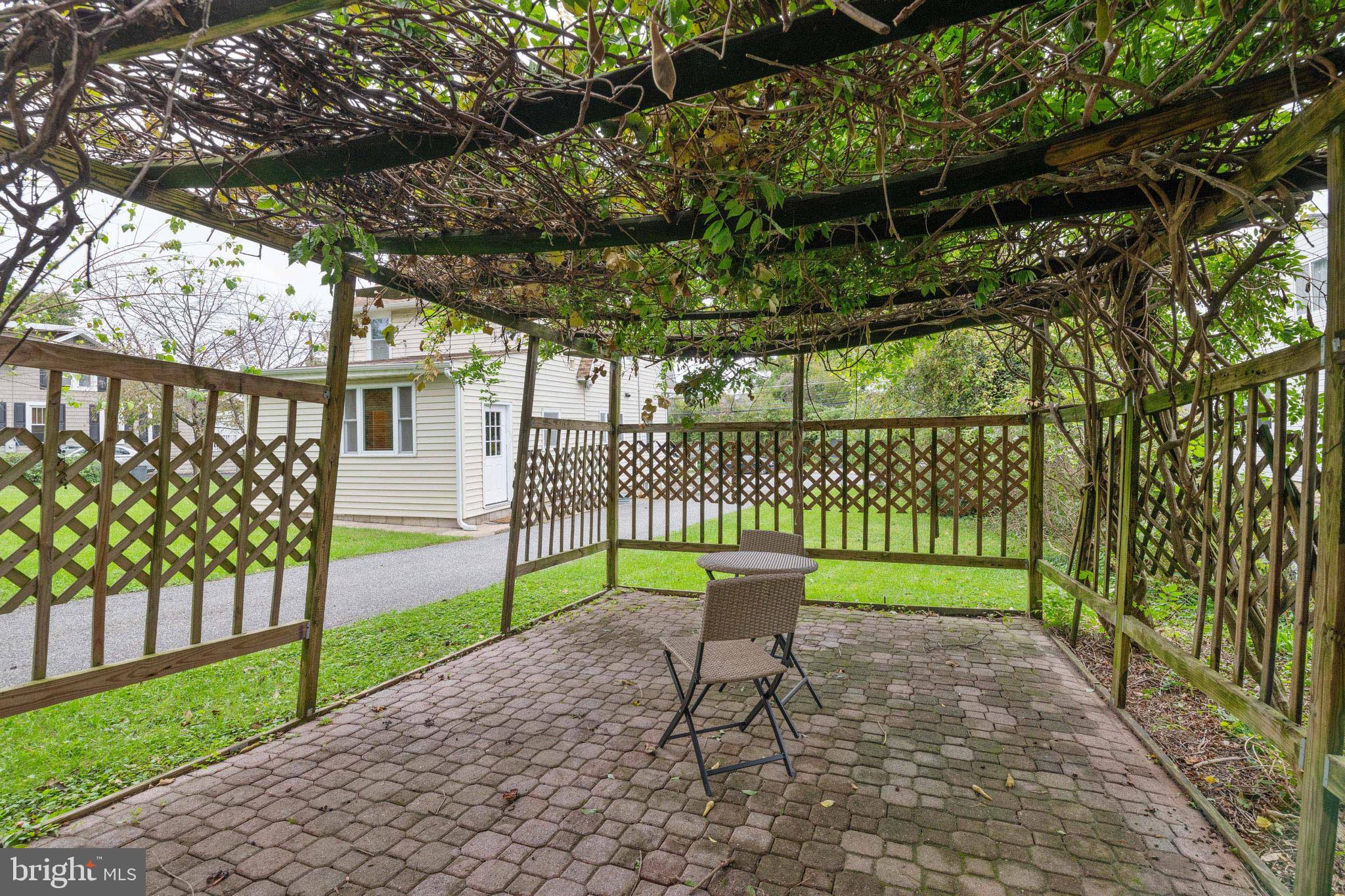 45 Cinder Road Lutherville-Timonium, MD 21093 - Photo 32 of 41 Wisteria Covered Paver Patio