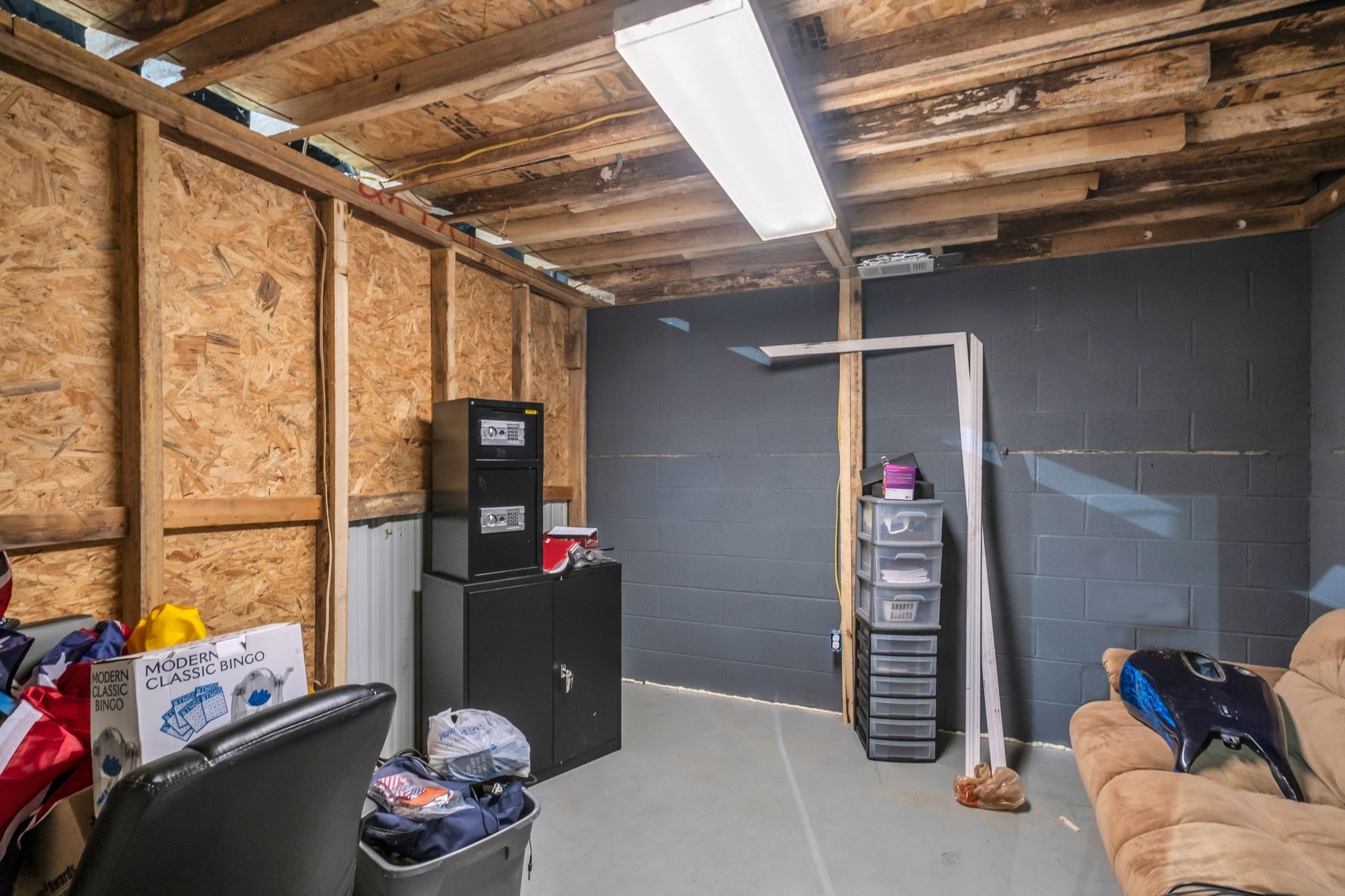 1409 Buffalo Road, Unit C Lawrenceburg, TN 38464 - Photo 14 of 15 a room with lots of different colored cloths