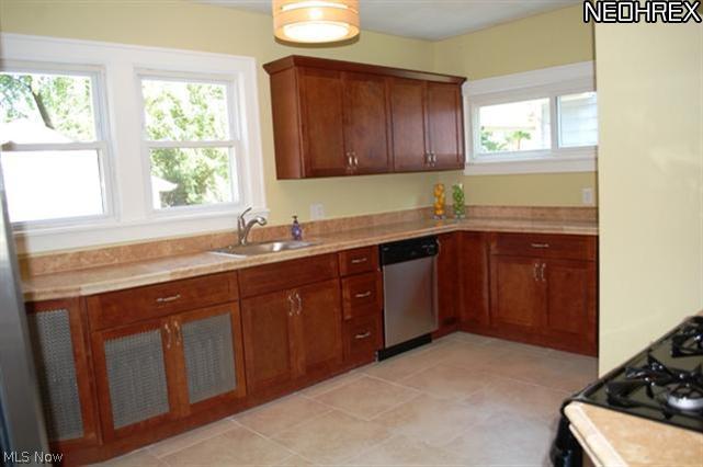3125 Yorkshire Road Cleveland, OH 44118 - Photo 3 of 22 Large kitchen with lots of counter space, new ceramic floors and new cabinets