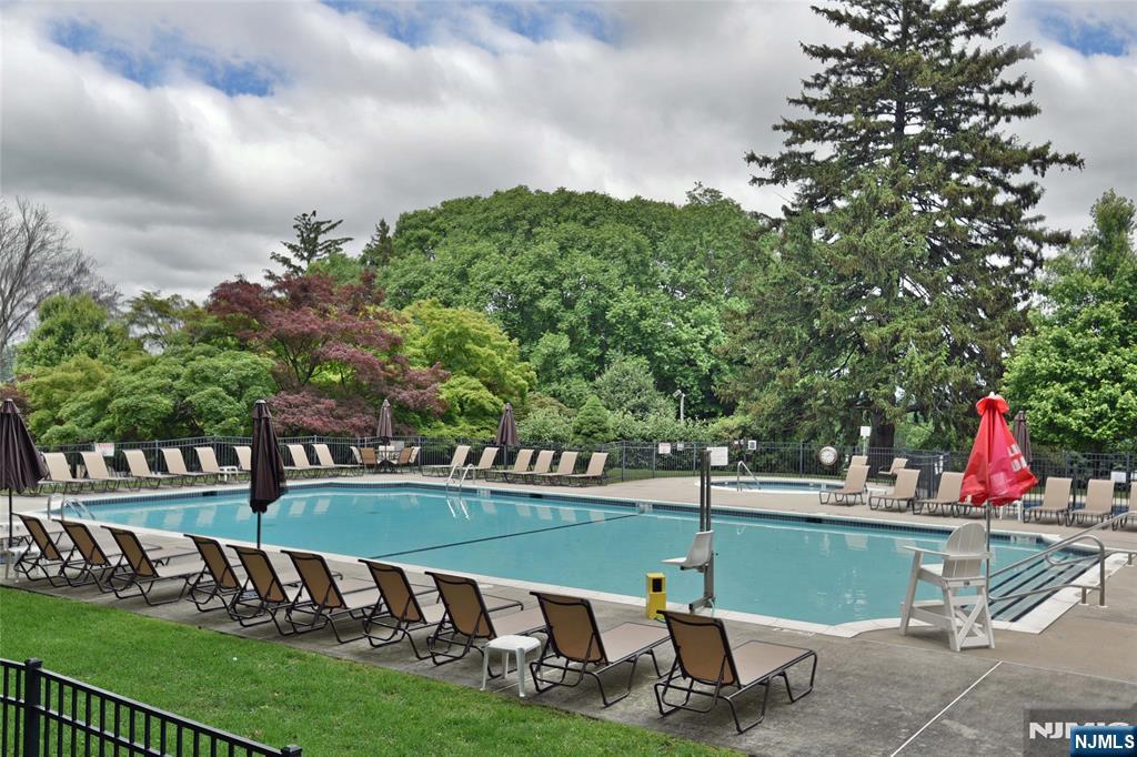 4201 Rio Vista Drive, Unit 4201 Mahwah, NJ 07430 - Photo 20 of 34 a view of a park with swings and slides