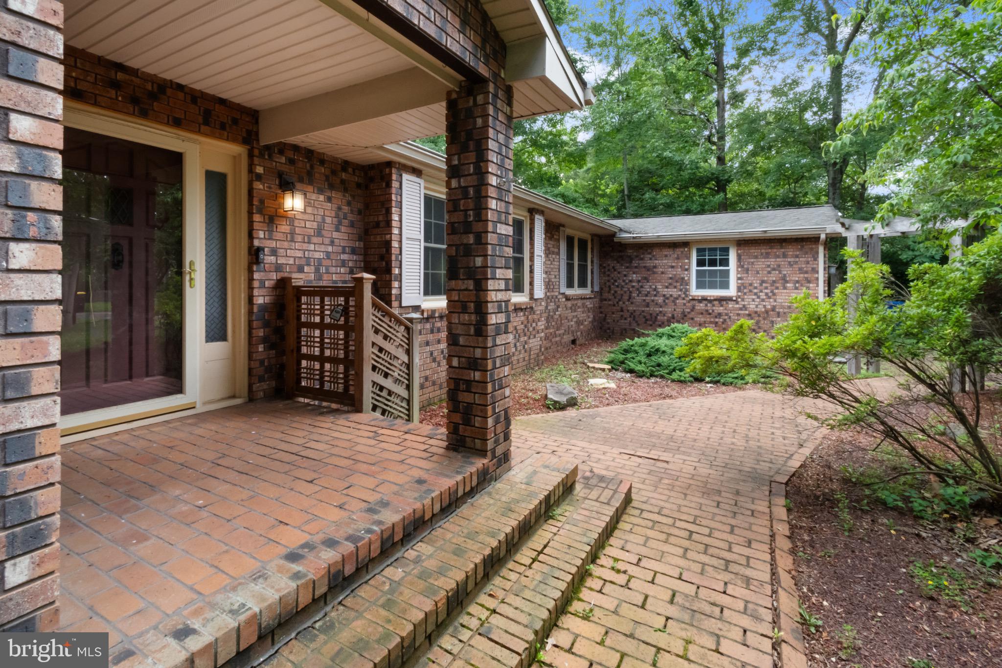 51 Christopher Mill Road Medford, NJ 08055 - Photo 5 of 24 Charming entryway with lush greenery.
