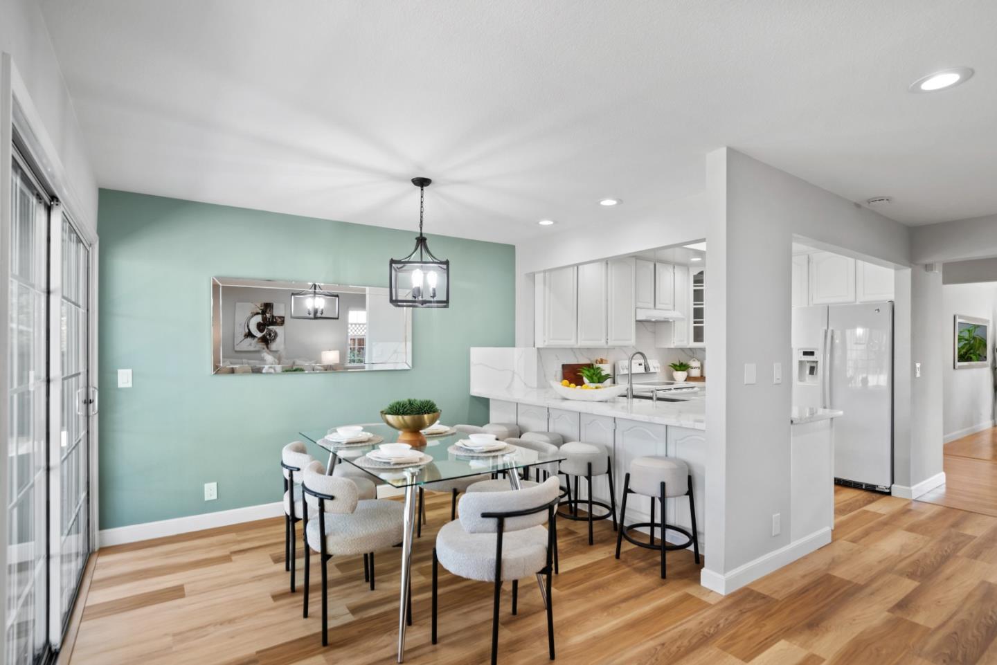 965 Buckeye Drive Sunnyvale, CA 94086 - Photo 11 of 27 a view of a dining room with furniture and wooden floor