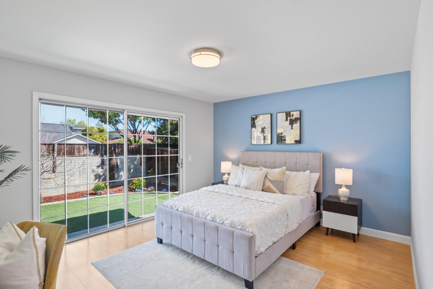 965 Buckeye Drive Sunnyvale, CA 94086 - Photo 15 of 27 a bedroom with a bed and a view of outdoor