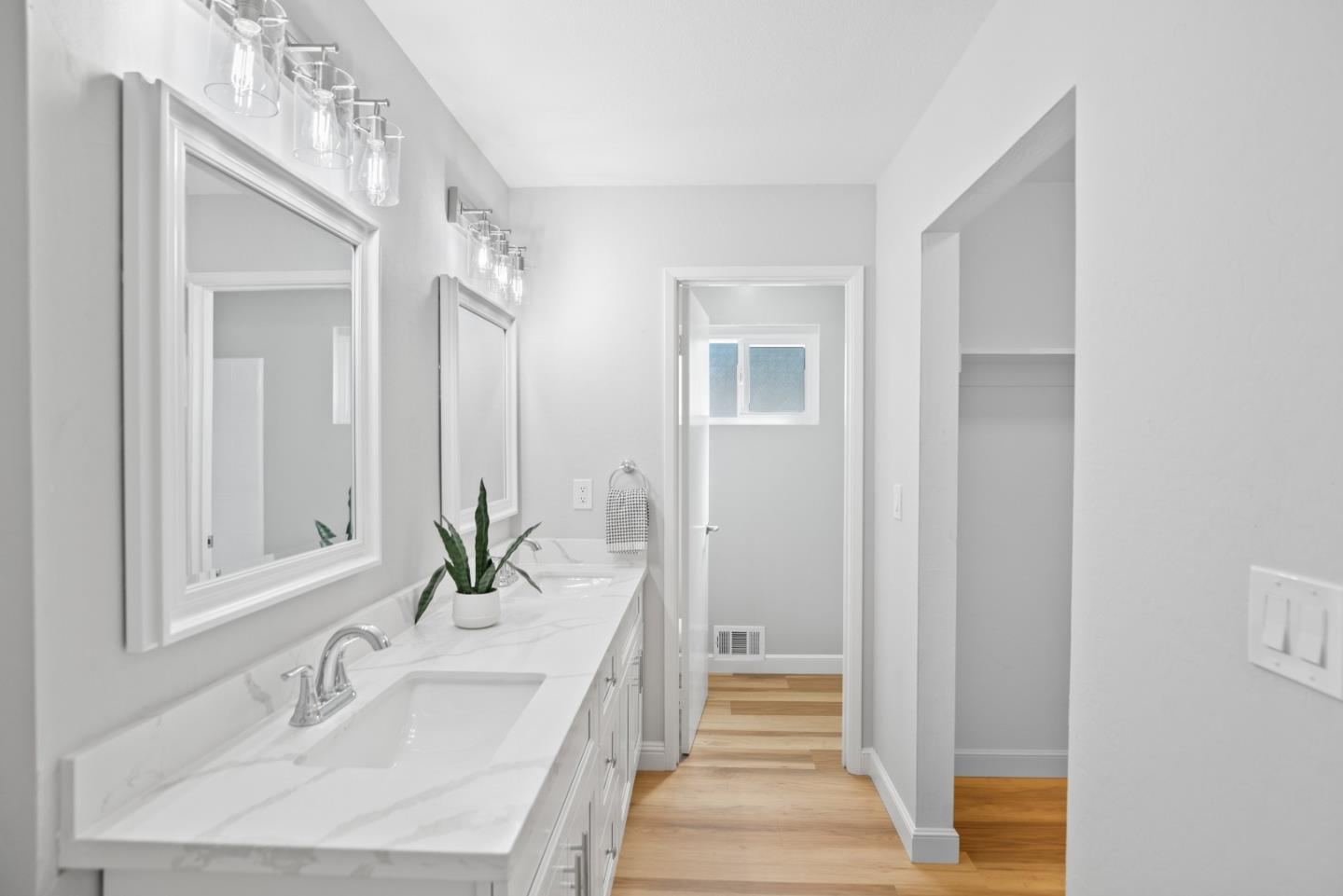 965 Buckeye Drive Sunnyvale, CA 94086 - Photo 18 of 27 a en suite bathroom with a sink and a mirror