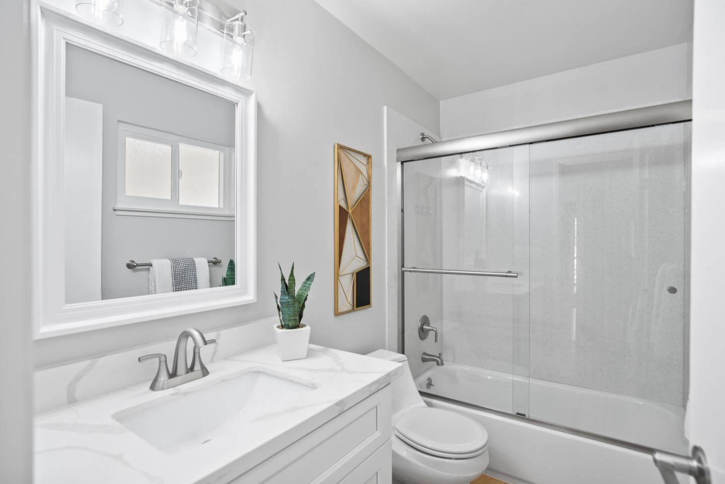 965 Buckeye Drive Sunnyvale, CA 94086 - Photo 22 of 27 a bathroom with a sink toilet and shower