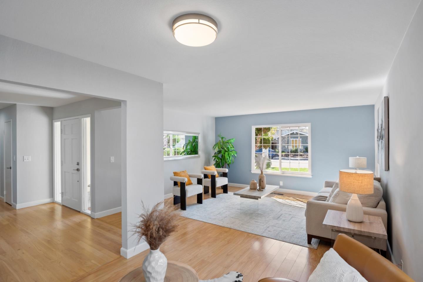 965 Buckeye Drive Sunnyvale, CA 94086 - Photo 4 of 27 a living room with furniture and a large window