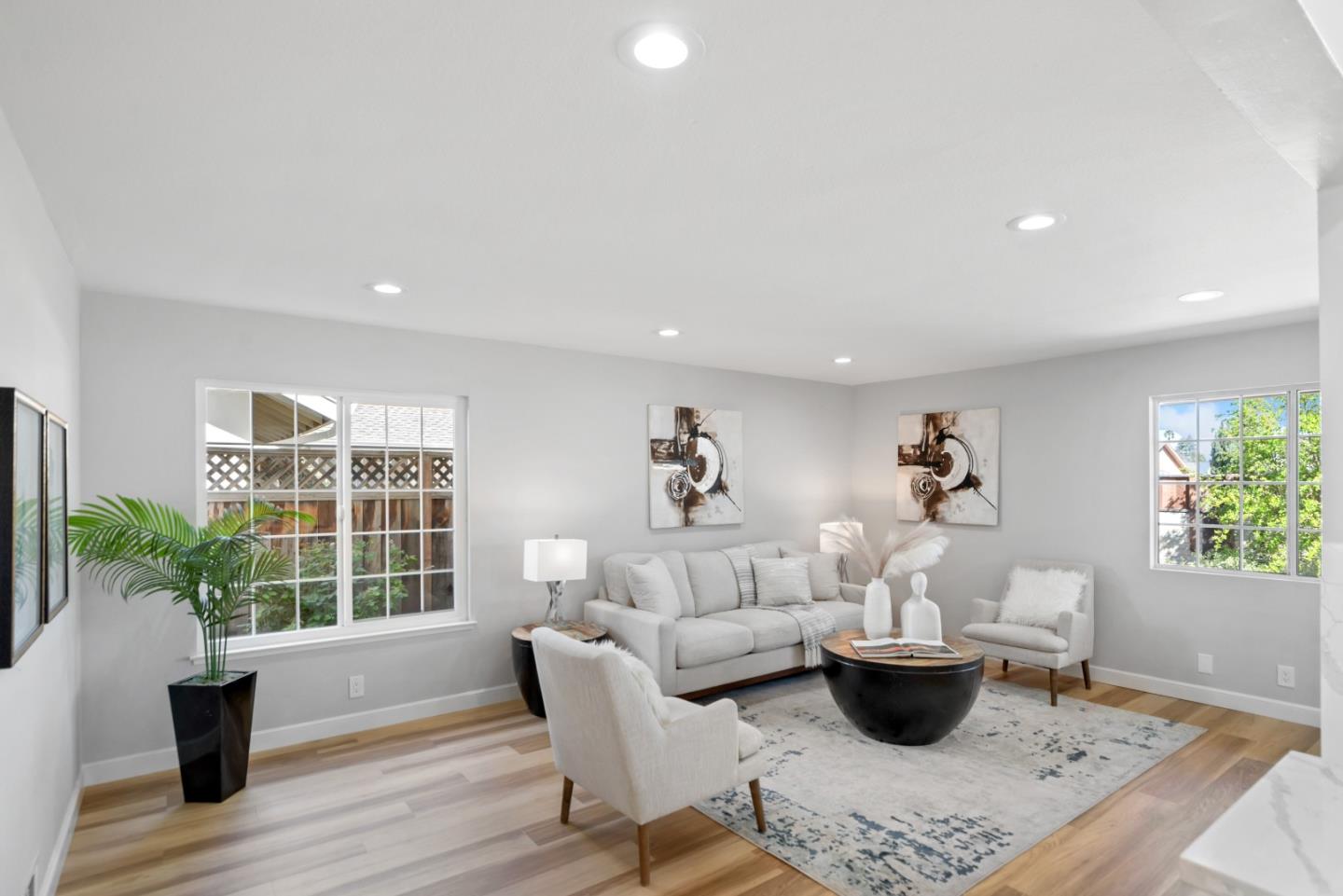 965 Buckeye Drive Sunnyvale, CA 94086 - Photo 7 of 27 a living room with furniture a window and a potted plant