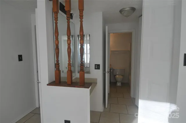 a bathroom with a shower and toilet