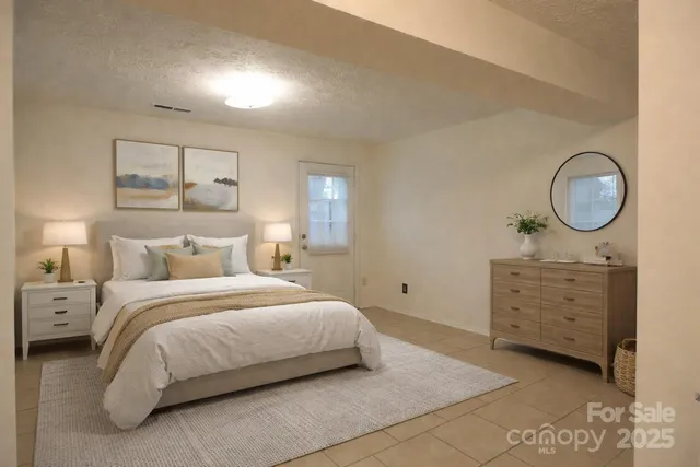 a bedroom with a bed and closet