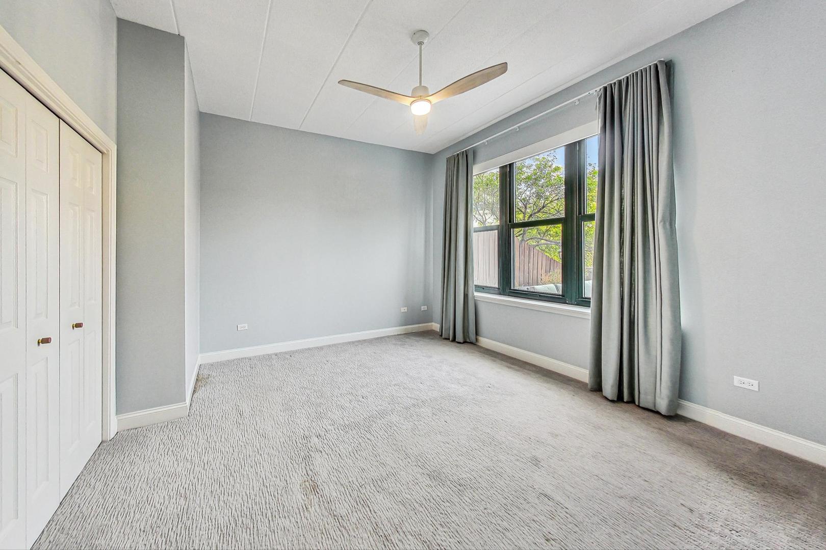 1301 West Washington Boulevard, Unit 208 Chicago, IL 60607 - Photo 15 of 37 a view of an empty room with a window