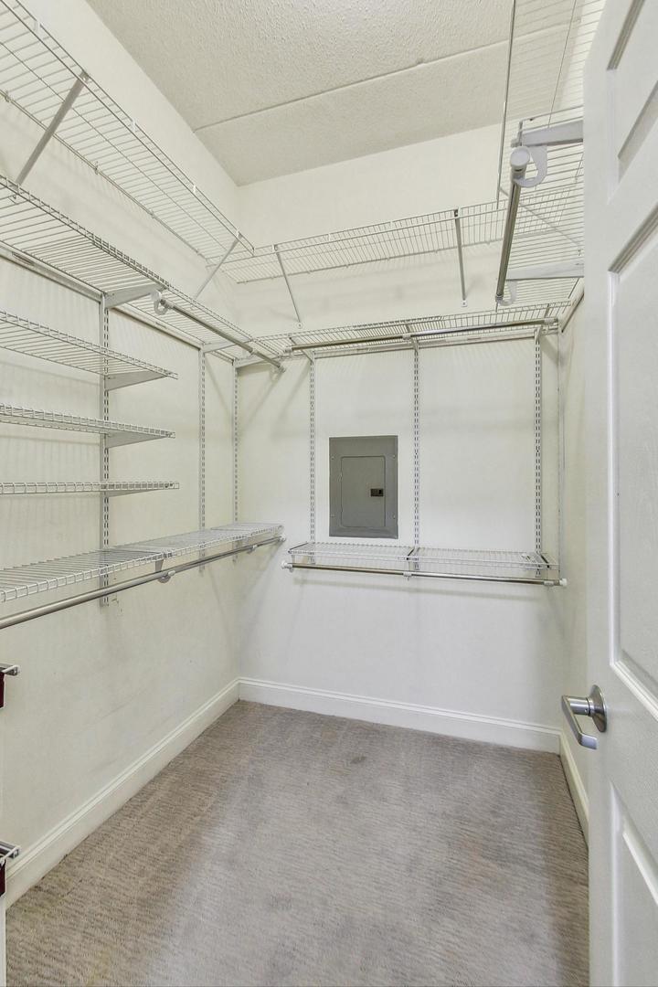 1301 West Washington Boulevard, Unit 208 Chicago, IL 60607 - Photo 22 of 37 a view of a room with racks on the wall