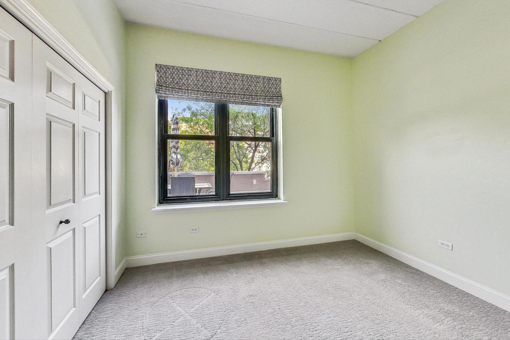 1301 West Washington Boulevard, Unit 208 Chicago, IL 60607 - Photo 23 of 37 a view of an empty room with a window