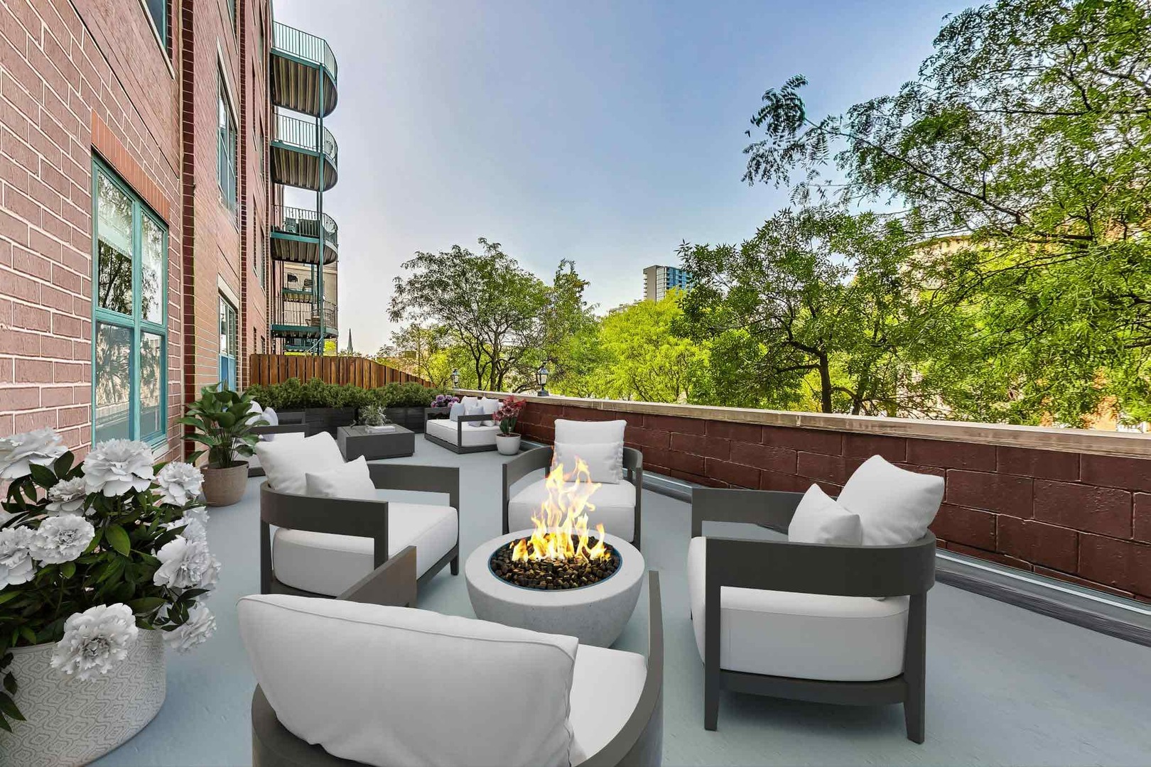 1301 West Washington Boulevard, Unit 208 Chicago, IL 60607 - Photo 28 of 37 a outdoor living space with furniture and a potted plant