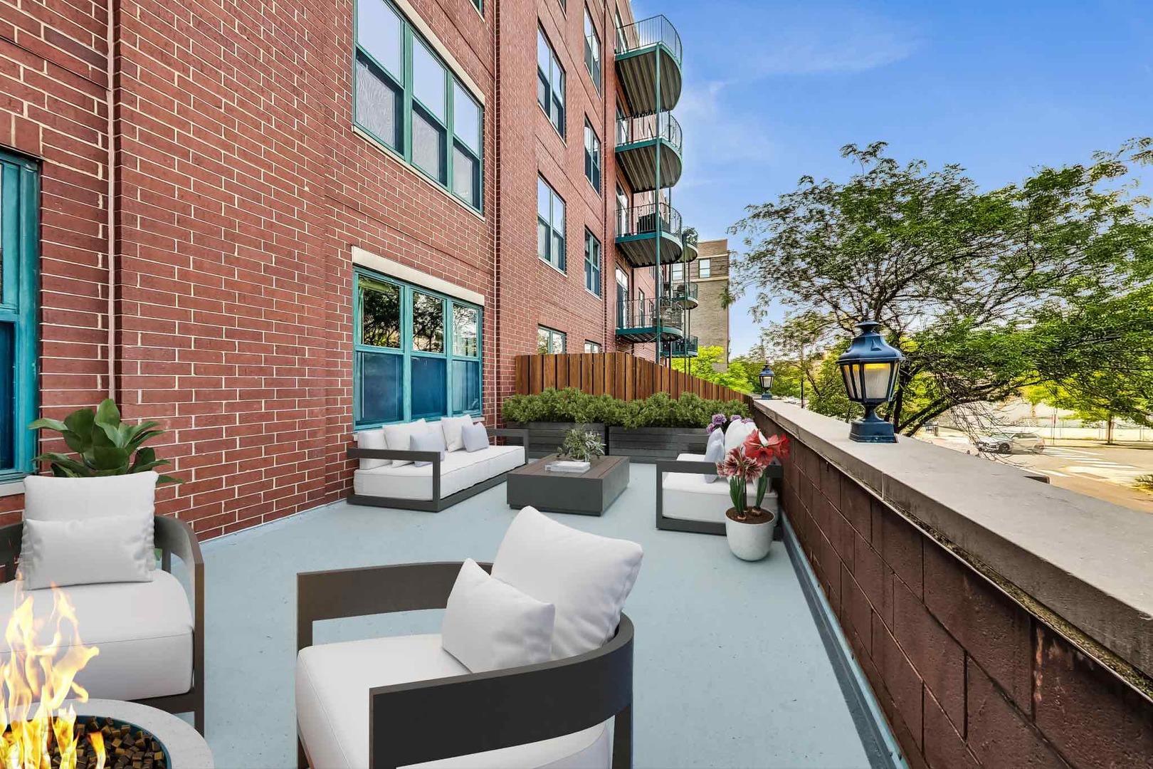 1301 West Washington Boulevard, Unit 208 Chicago, IL 60607 - Photo 29 of 37 a view of a patio with couches and potted plants