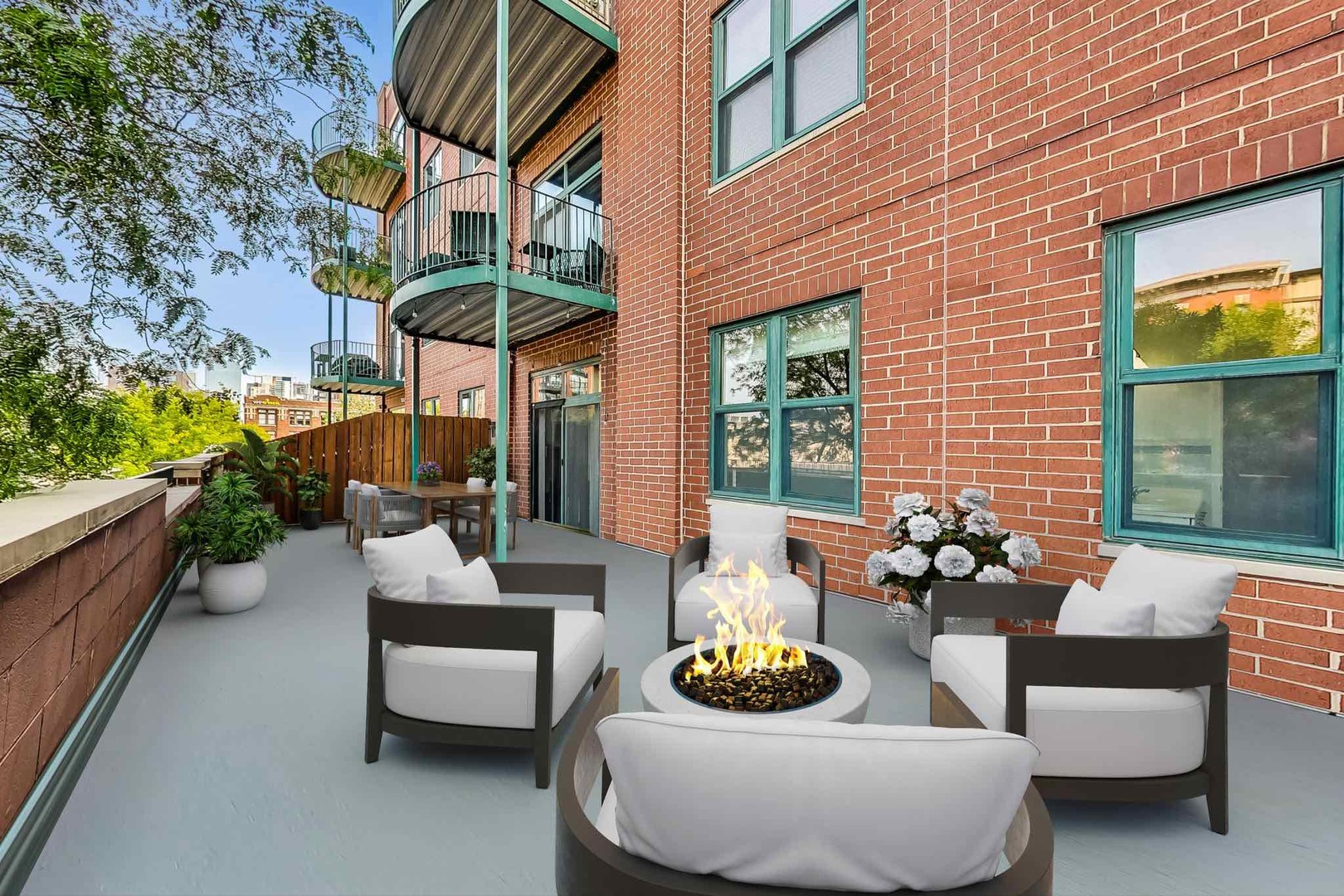 1301 West Washington Boulevard, Unit 208 Chicago, IL 60607 - Photo 30 of 37 a outdoor space with patio couches and a potted plant