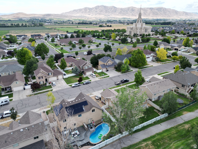 1585 South 910 West Payson, UT 84651 - Photo 27 of 32 Aerial perspective showcasing a residential neighborhood with mountain backdrop
