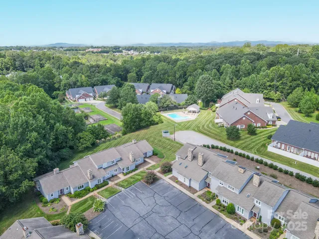 an aerial view of a house with a garden