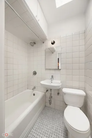 a kitchen with stainless steel appliances a sink and a stove