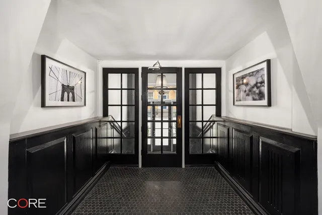 a white toilet sitting next to a white bath tub sitting next to a white sink