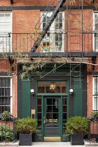 a view of hallway with windows