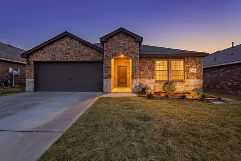 a view of a house with a outdoor space and window
