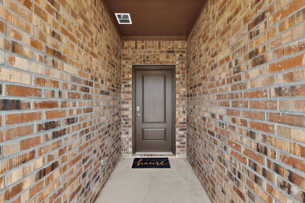 2945 Roper Street Royse City, TX 75189 - Photo 25 of 25 a view of a door and an outdoor space