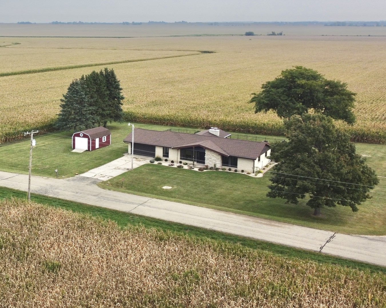 3825 South Queens Road Rochelle, IL 61068 - Photo 1 of 39 a view of a lake with a yard