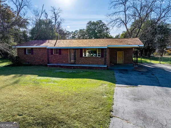 a view of a house with garden