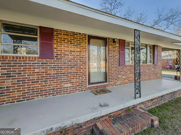 a view of house with a door
