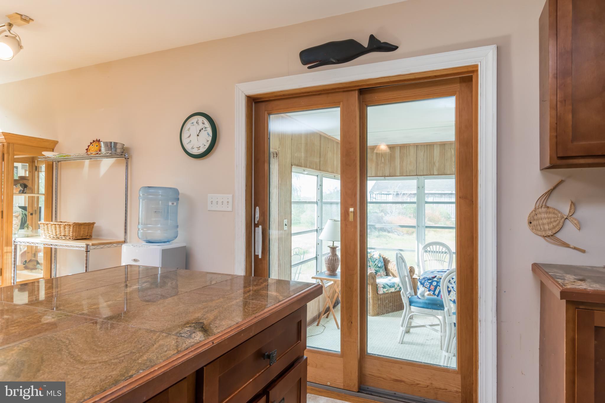 10577 Harrison Point Road Deal Island, MD 21821 - Photo 16 of 36 a view of a kitchen with a window