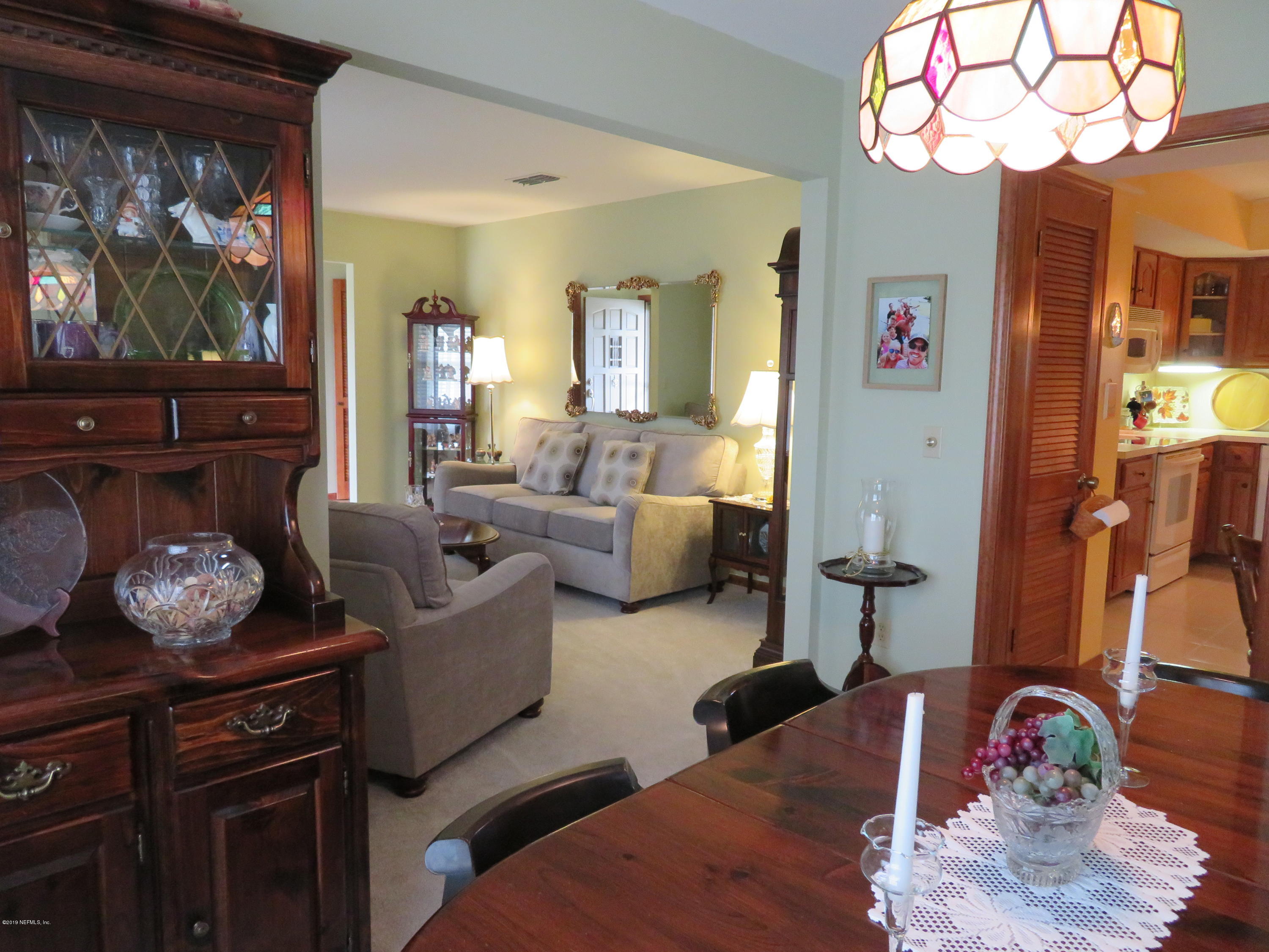9131 Latimer Road East Jacksonville, FL 32257 - Photo 3 of 28 DINING ROOM TO KITCHEN TO LIVING