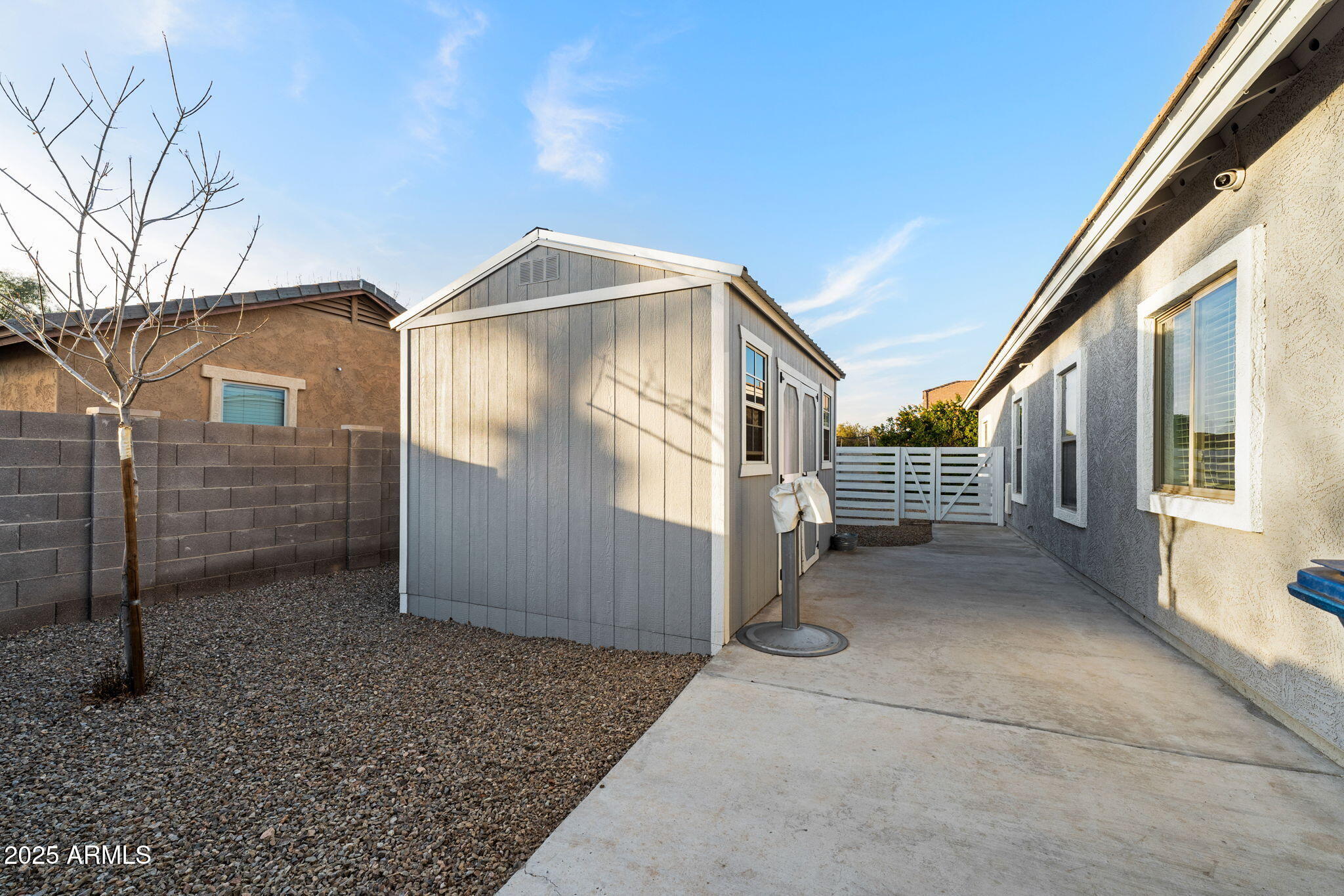 21932 East Rosa Road Queen Creek, AZ 85142 - Photo 17 of 19 a view of a house with a yard