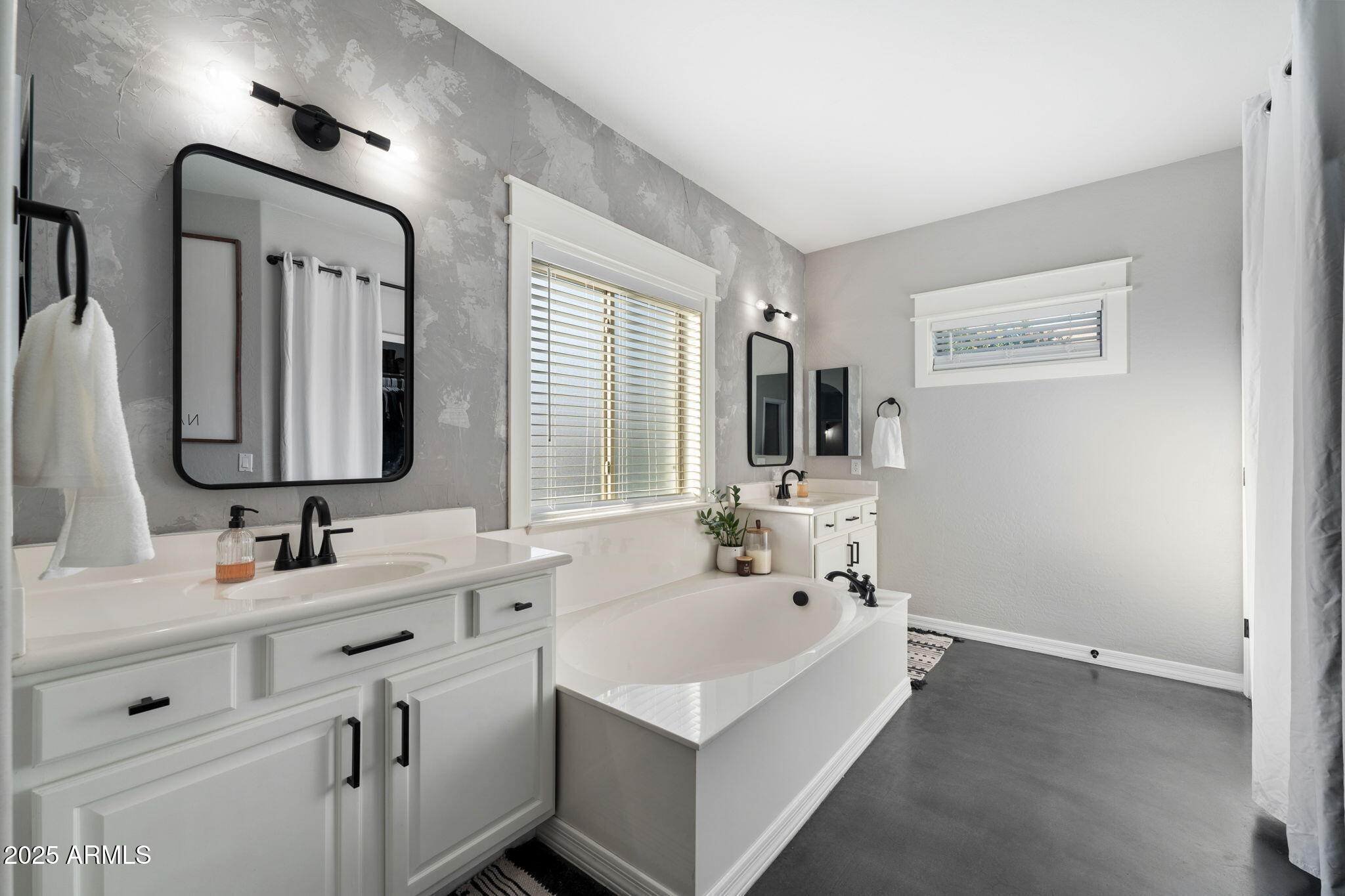 21932 East Rosa Road Queen Creek, AZ 85142 - Photo 8 of 19 a bathroom with a double vanity sink mirror and double