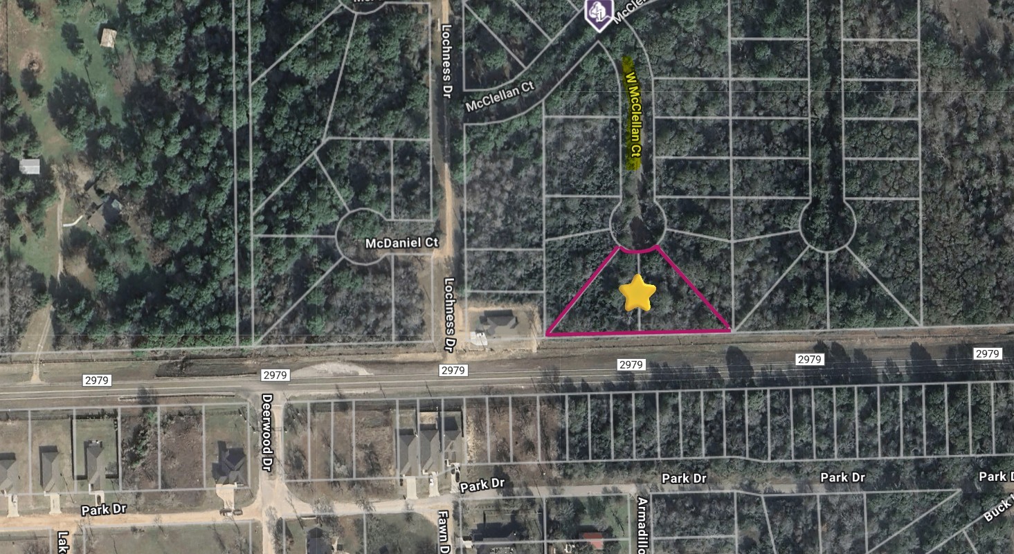 29699 Mcclellan Court West Hempstead, TX 77445 - Photo 18 of 18 a view of a building with a small yard and wooden fence