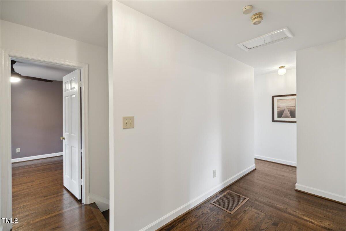 3317 Harden Road Raleigh, NC 27607 - Photo 31 of 53 a view of an empty room with wooden floor