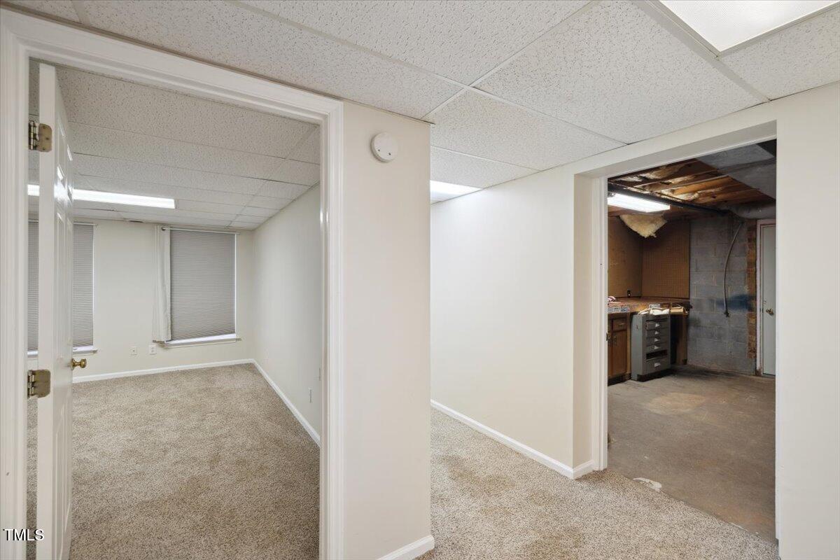 3317 Harden Road Raleigh, NC 27607 - Photo 43 of 53 a view of a hallway with a bedroom