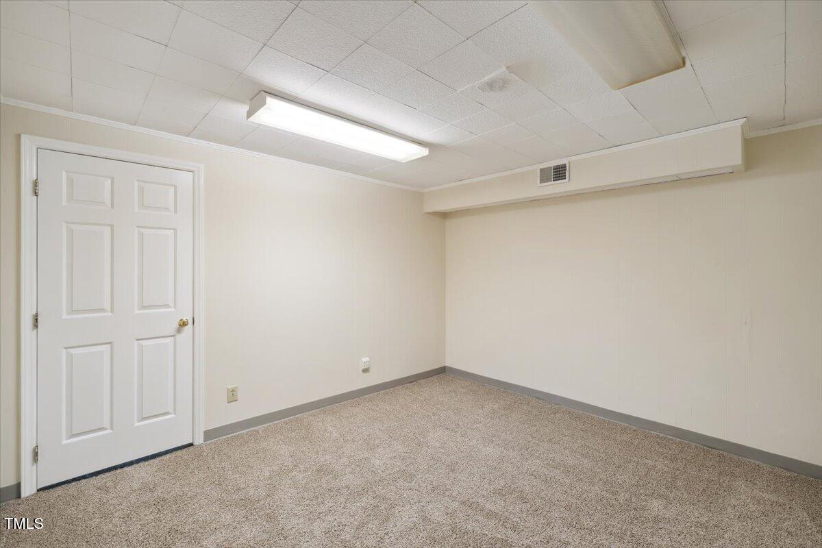 3317 Harden Road Raleigh, NC 27607 - Photo 45 of 53 an empty room with a empty space