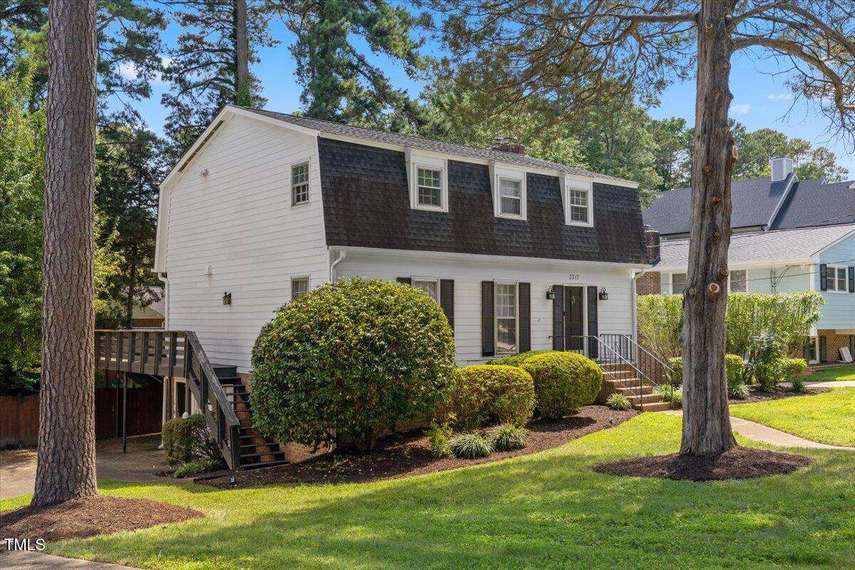 3317 Harden Road Raleigh, NC 27607 - Photo 10 of 53 a view of a house with backyard and a tree
