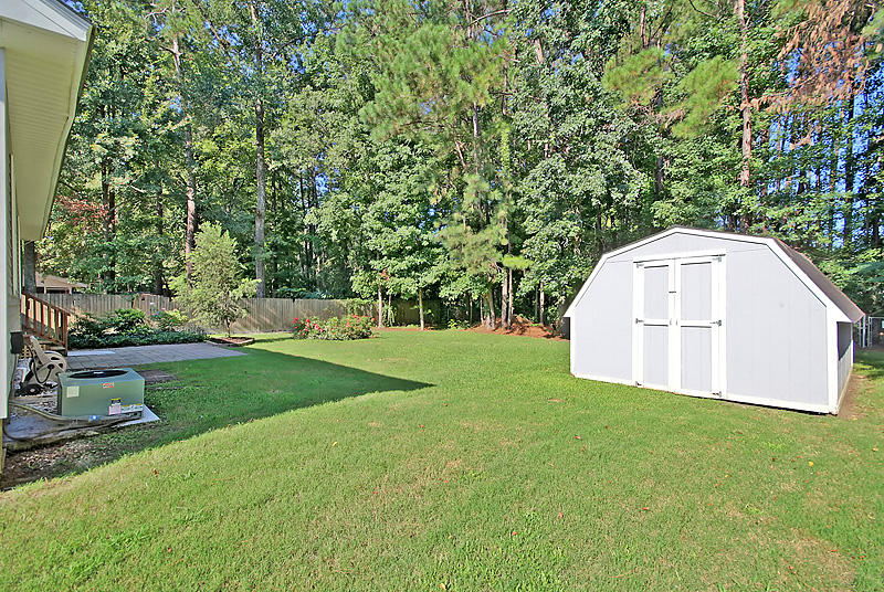 153 Iron Road Summerville, SC 29486 - Photo 24 of 28 Storage shed in the fenced-in backyard