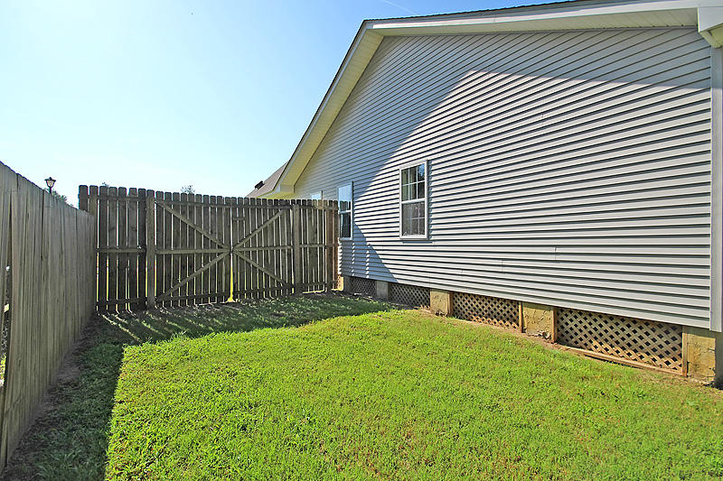 153 Iron Road Summerville, SC 29486 - Photo 25 of 28 Wooden-enclosed backyard with a gate
